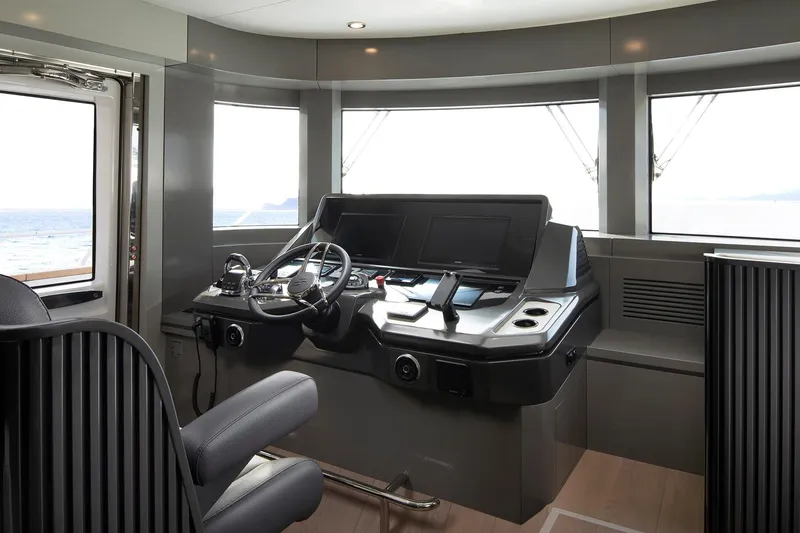 Yacht Photos Pics Modern helm of 2027 Sirena 68 yacht with advanced navigation controls.
