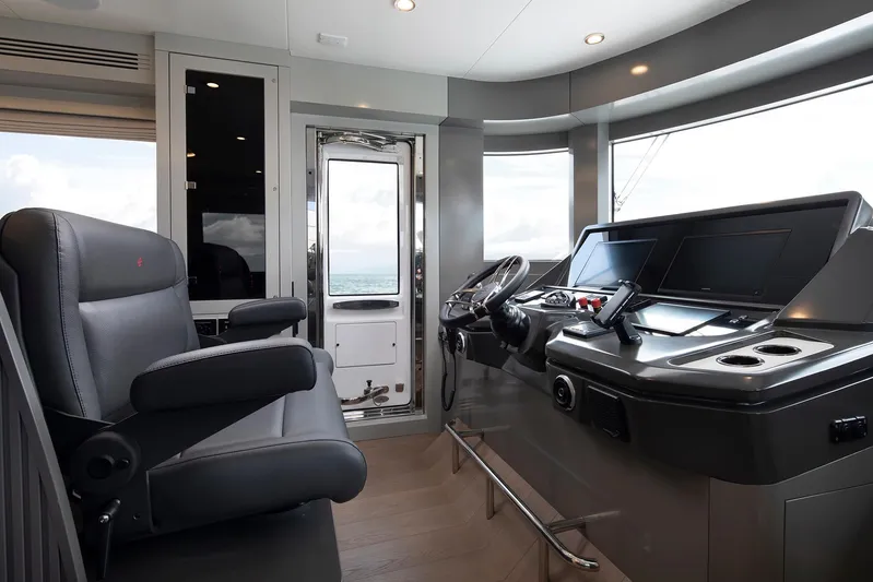  Yacht Photos Pics Modern helm station of 2027 Sirena 68 yacht with advanced navigation controls.