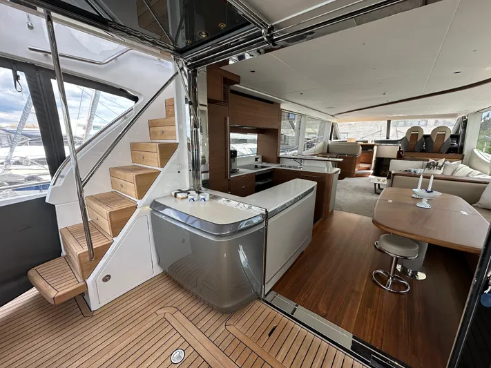  Yacht Photos Pics Luxurious interior of 2022 Princess Y72 yacht with modern design and elegant furnishings.
