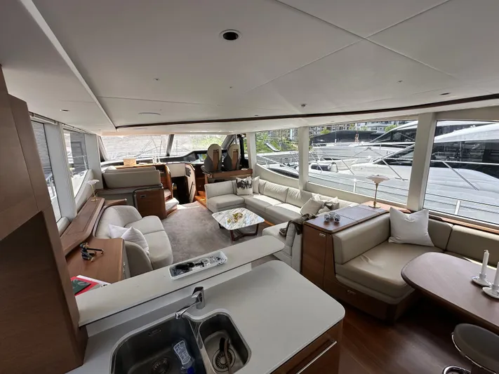  Yacht Photos Pics Luxurious interior of 2022 Princess Y72 yacht with modern furnishings and spacious layout.
