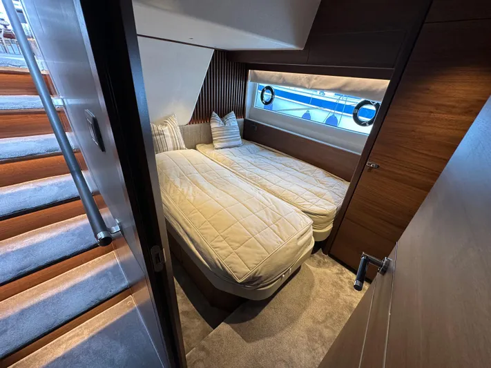  Yacht Photos Pics Luxurious cabin interior of 2022 Princess Y72 yacht with twin beds and modern design.