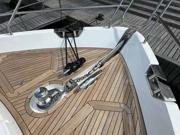  Yacht Photos Pics Bow of 2022 Princess Y72 yacht with teak decking and anchor system.