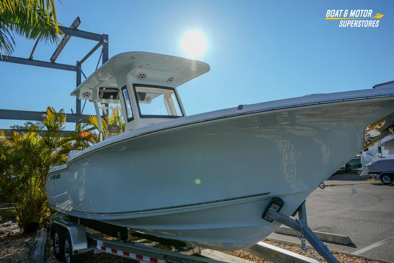  Yacht Photos Pics 2026 Key West 260 Center Console boat on trailer under sunny sky.