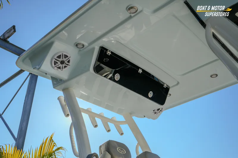 Yacht Photos Pics 2026 Key West 260 Center Console boat roof with speakers and storage, under clear blue sky.
