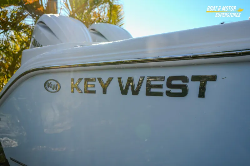  Yacht Photos Pics 2026 Key West 260 Center Console boat with logo in sunlight.