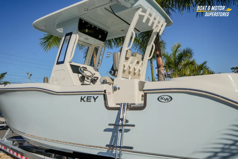  Yacht Photos Pics 2026 Key West 260 Center Console boat with palm trees in the background.
