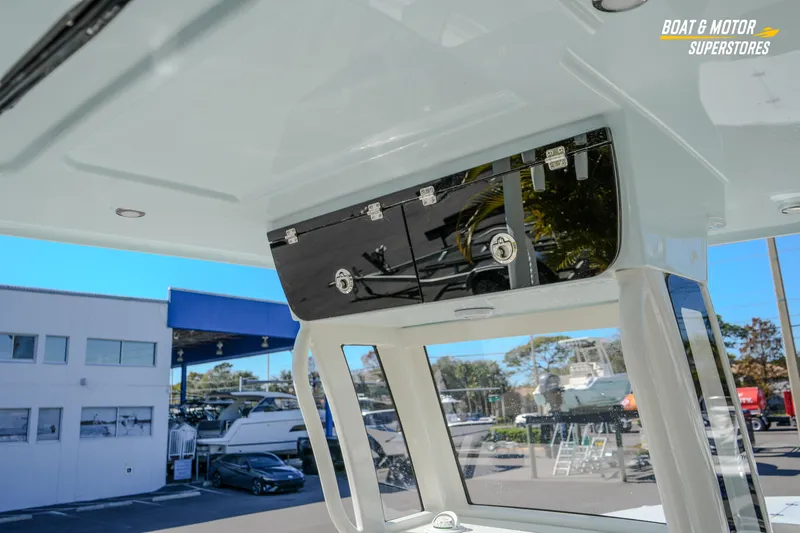  Yacht Photos Pics 2026 Key West 260 Center Console boat interior with storage compartment at dealership.