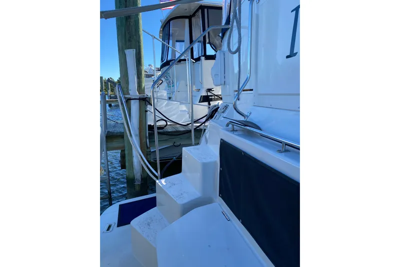 Irish Hurricane Yacht Photos Pics 1998 Carver 445 Aft Cabin Motor Yacht docked, featuring steps and railing.