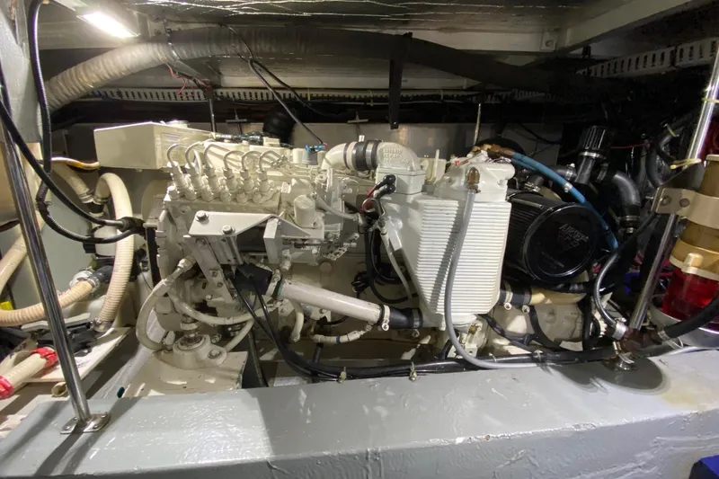 Irish Hurricane Yacht Photos Pics Engine room of 1998 Carver 445 Aft Cabin Motor Yacht, showcasing mechanical components.