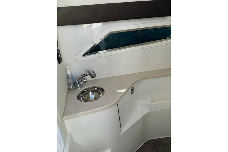  Yacht Photos Pics 2013 Cobalt 336 boat interior with sink and countertop.