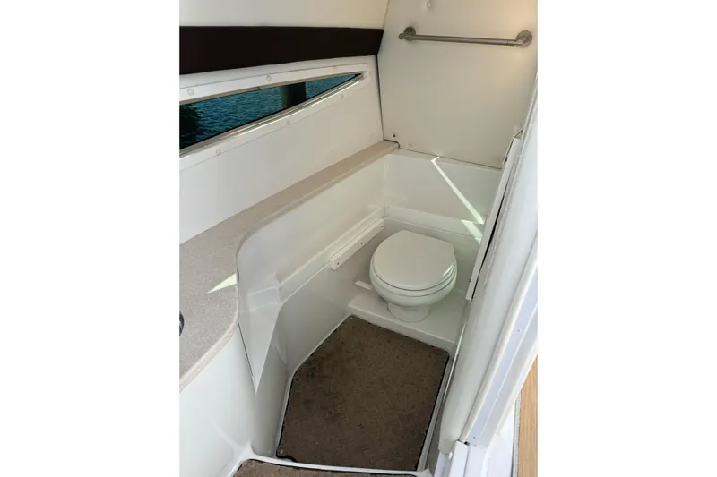  Yacht Photos Pics 2013 Cobalt 336 boat interior bathroom with toilet and countertop.