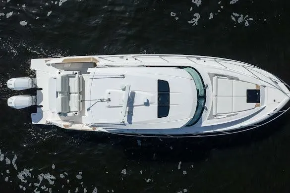  Yacht Photos Pics Aerial view of 2022 Tiara Sport 43 LE luxury yacht on water.