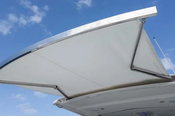  Yacht Photos Pics 2022 Tiara Sport 43 LE boat canopy against blue sky.