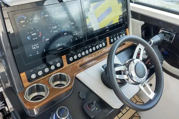  Yacht Photos Pics 2022 Tiara Sport 43 LE helm with advanced navigation displays and controls.
