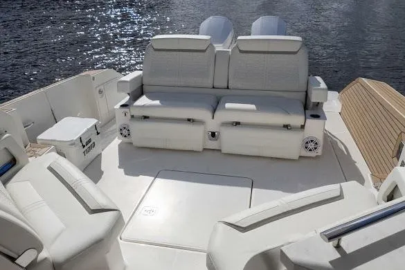  Yacht Photos Pics 2022 Tiara Sport 43 LE boat interior with luxurious seating and water view.