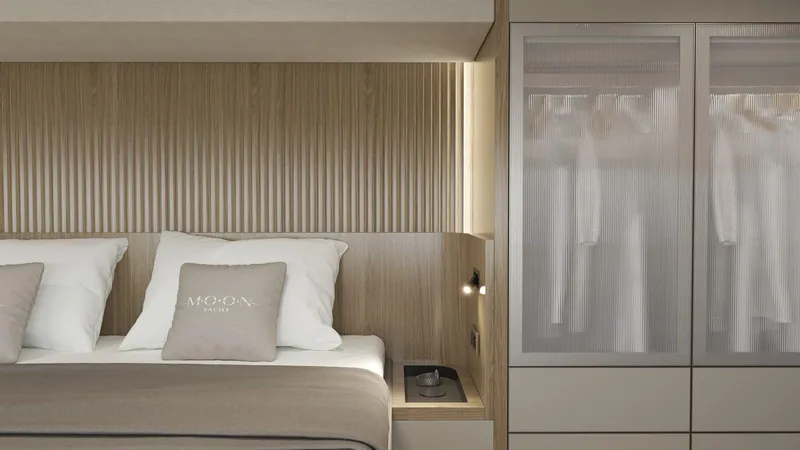 New Moon 60 Power Yacht Photos Pics Luxurious bedroom interior of 2025 Moon 60 Power yacht with modern design elements.