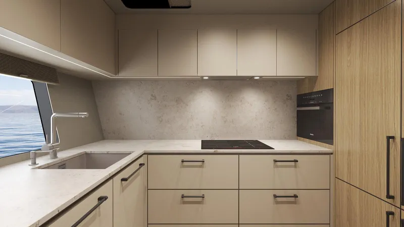 New Moon 60 Power Yacht Photos Pics Modern yacht kitchen interior with sleek cabinetry, built-in appliances, and ocean view. Moon 60 Power 2025.