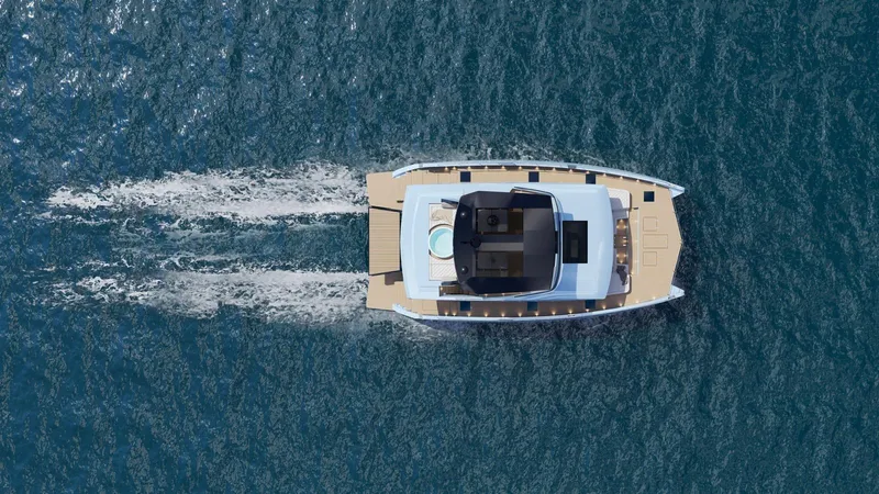 New Moon 60 Power Yacht Photos Pics Top view of 2025 Moon 60 Power yacht cruising on blue ocean waters.