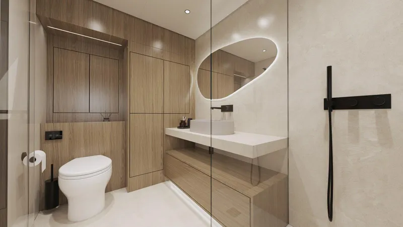 New Moon 60 Power Yacht Photos Pics Modern bathroom with wood accents, oval mirror, and sleek fixtures in a 2025 Moon 60 Power model.