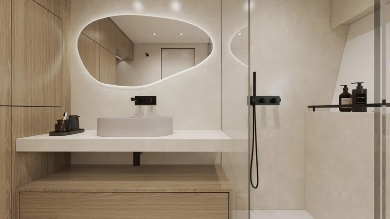 New Moon 60 Power Yacht Photos Pics Modern bathroom interior with wooden accents, featuring a sleek sink and illuminated mirror, in a 2025 Moon 60 Power.