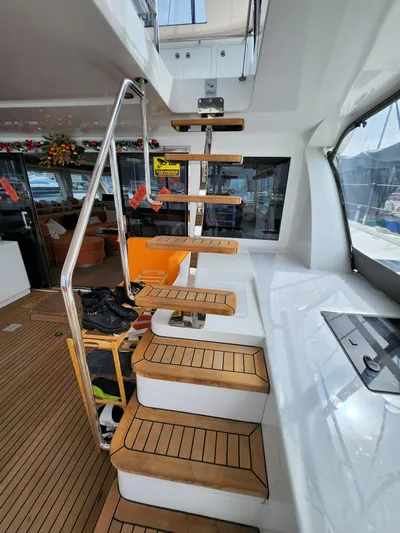  Yacht Photos Pics Staircase on 2025 Heysea Seaview 56 yacht with wooden steps and modern interior design.