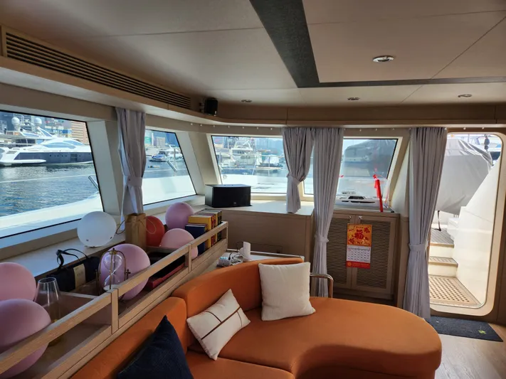  Yacht Photos Pics Luxurious interior of 2025 Heysea Seaview 56 yacht with modern decor and marina view.