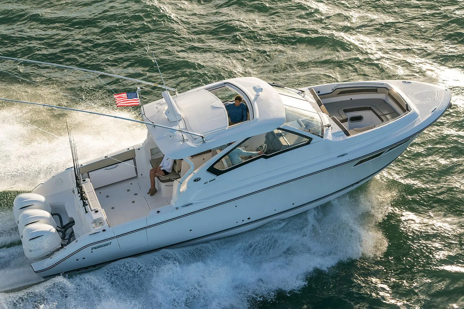 Manufacturer Provided Image: 2018 Pursuit DC 365 Dual Console boat cruising on the water.
