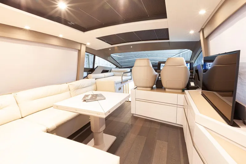 M/y "ghep" Yacht Photos Pics Luxurious interior of 2022 Pershing 7X yacht with modern seating and sleek design.