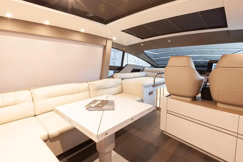 M/y "ghep" Yacht Photos Pics Luxurious interior of 2022 Pershing 7X yacht with plush seating and modern design.