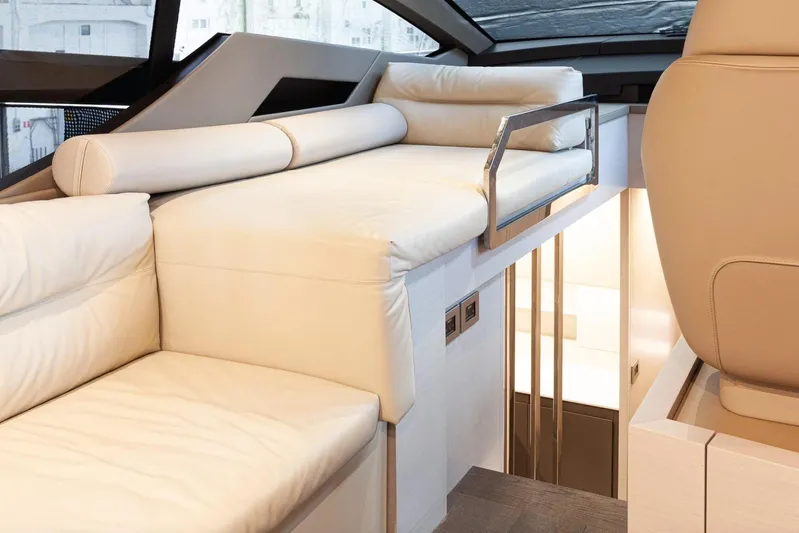 M/y "ghep" Yacht Photos Pics Luxurious interior of 2022 Pershing 7X yacht with elegant seating and modern design.