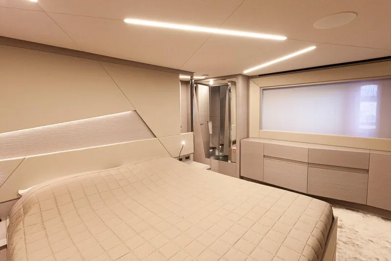 M/y "ghep" Yacht Photos Pics Luxurious interior of 2022 Pershing 7X yacht bedroom with modern design and ambient lighting.