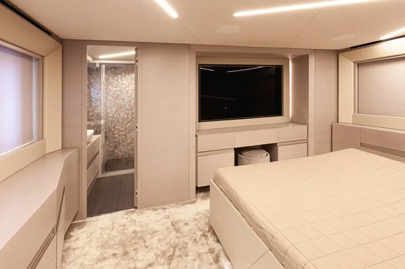 M/y "ghep" Yacht Photos Pics Luxurious interior of 2022 Pershing 7X yacht featuring modern bedroom and elegant bathroom.