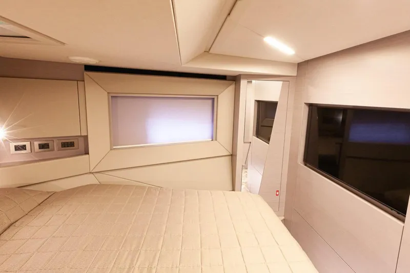 M/y "ghep" Yacht Photos Pics Luxurious interior of 2022 Pershing 7X yacht bedroom with modern design and ambient lighting.