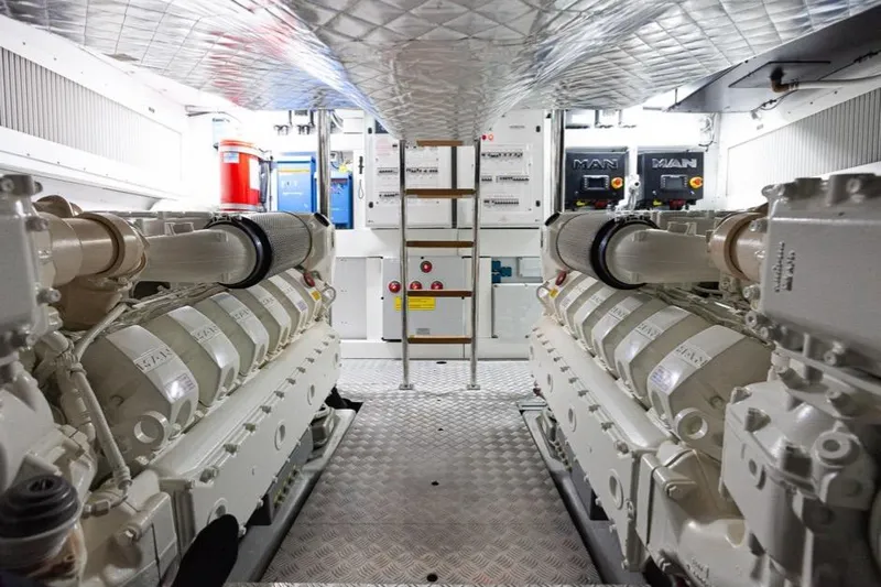 M/y "ghep" Yacht Photos Pics Engine room of 2022 Pershing 7X yacht, featuring dual MAN engines and control systems.