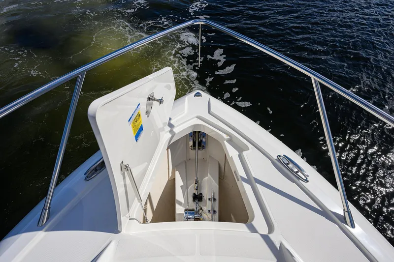 Let It Out Yacht Photos Pics Bow view of 2022 Tiara Yachts 43 LE with open anchor locker.