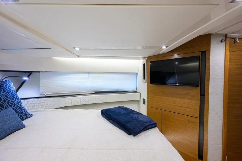 Let It Out Yacht Photos Pics Luxurious cabin interior of 2022 Tiara Yachts 43 LE with modern amenities and elegant design.
