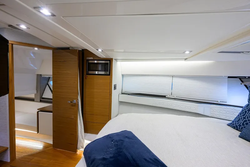 Let It Out Yacht Photos Pics Luxurious interior of 2022 Tiara Yachts 43 LE, featuring modern design and comfortable amenities.