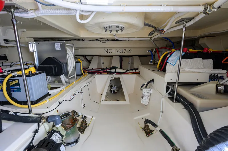 Let It Out Yacht Photos Pics Engine room of 2022 Tiara Yachts 43 LE, showcasing wiring and components.