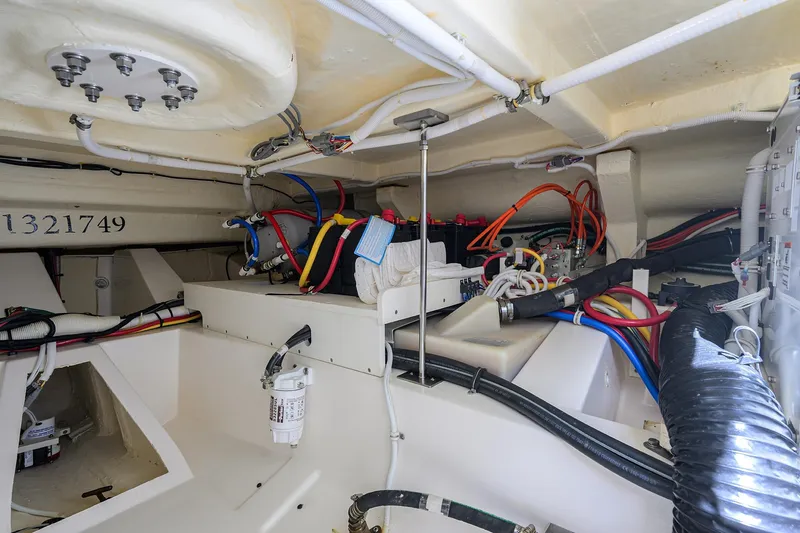 Let It Out Yacht Photos Pics Engine room of 2022 Tiara Yachts 43 LE with wiring and components.
