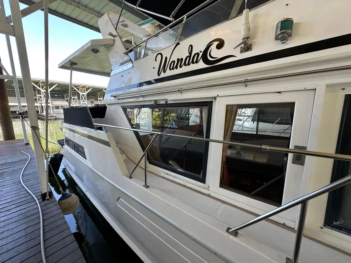  Yacht Photos Pics 1987 Ocean Alexander 46 Cockpit Motor Yacht docked in marina.