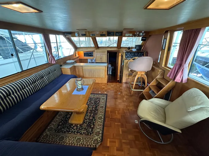  Yacht Photos Pics Interior of 1987 Ocean Alexander 46 Cockpit Motor Yacht with elegant seating and wooden finishes.