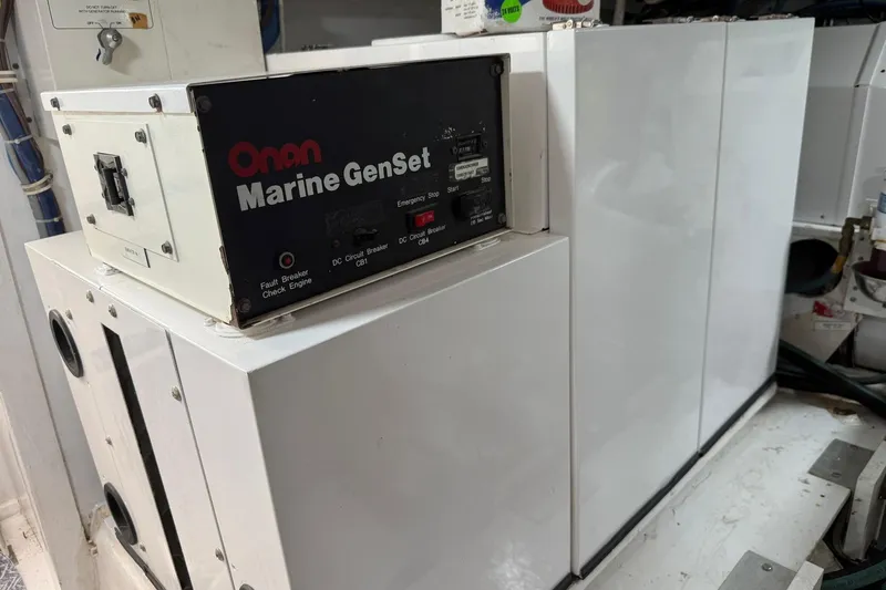 One Life Yacht Photos Pics Onan Marine GenSet in 2000 Hatteras 50 Convertible engine room.