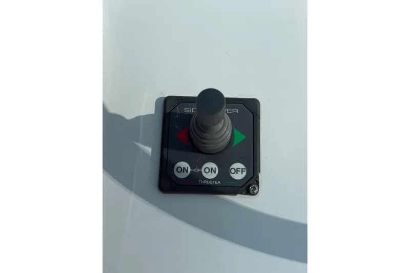 One Life Yacht Photos Pics Joystick control panel on a 2000 Hatteras 50 Convertible boat.