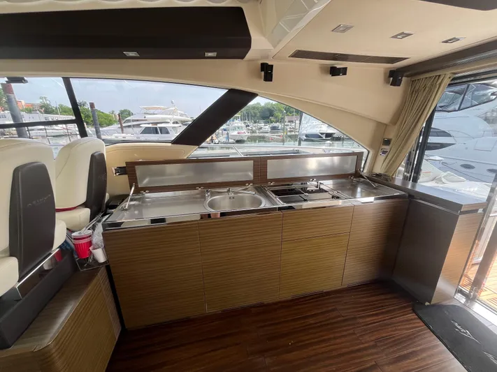 Penny Lane Yacht Photos Pics Luxurious interior of 2014 Azimut 55S yacht with modern kitchen amenities.