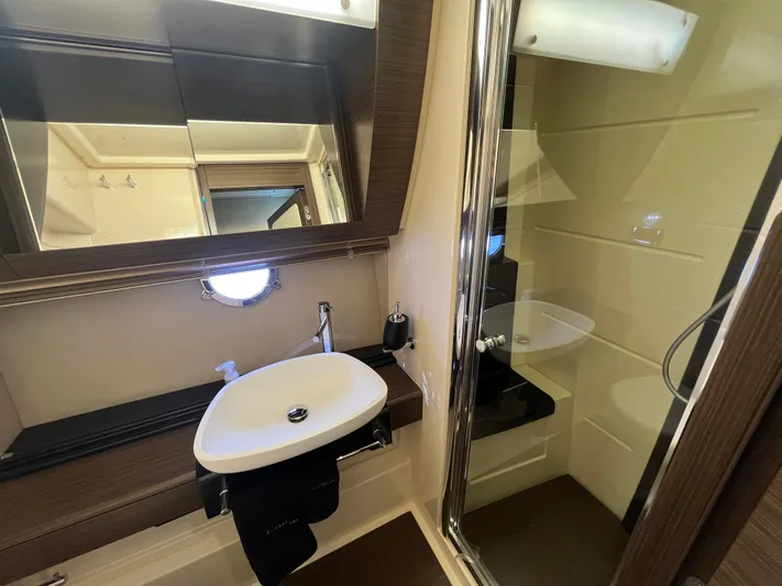 Penny Lane Yacht Photos Pics Luxurious bathroom in 2014 Azimut 55S yacht with modern sink and shower.