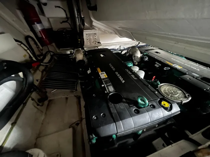 Penny Lane Yacht Photos Pics Engine room of a 2014 Azimut 55S yacht featuring a Volvo Penta engine.