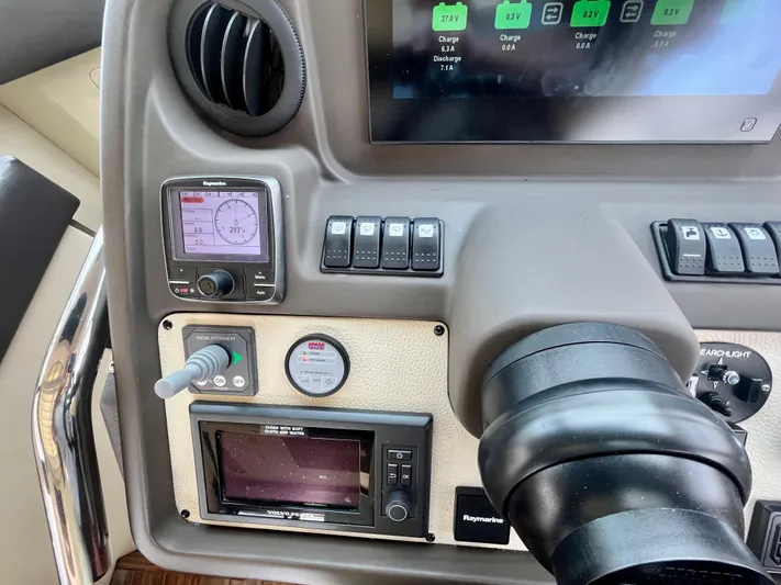 Penny Lane Yacht Photos Pics Control panel of a 2014 Azimut 55S yacht with navigation and monitoring systems.