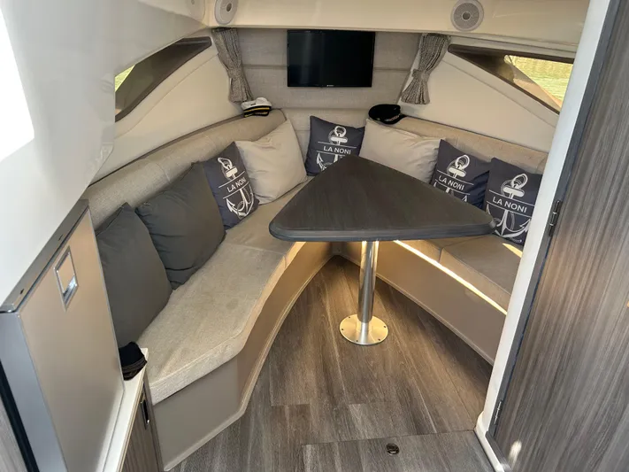 2023 Sea Ray 320 Sundancer @ Canucn Yacht Photos Pics 2023 Sea Ray Sundancer 320 interior with cozy seating and modern decor.
