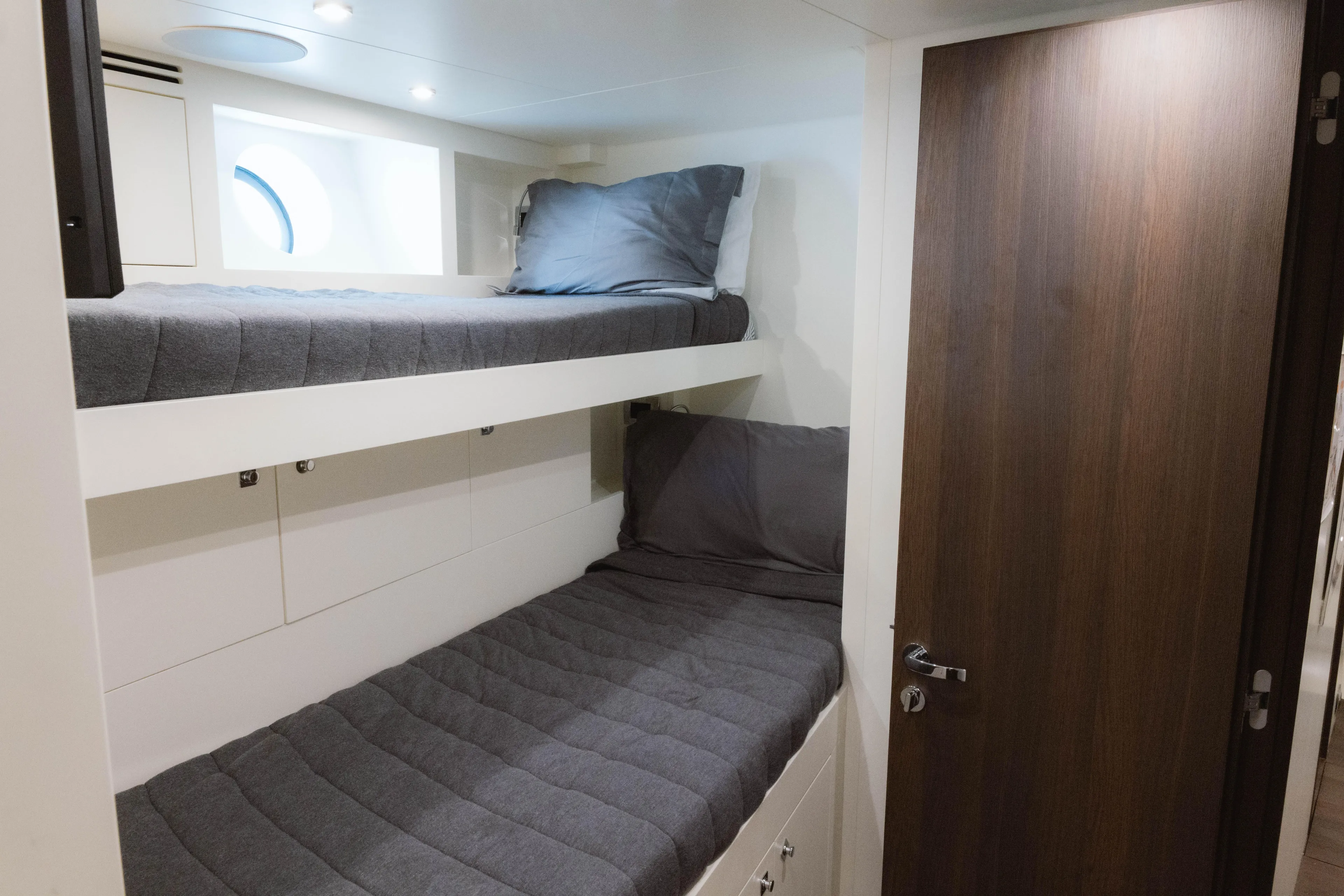 Carpe Diem Yacht Photos Pics 2023 Azimut 32M Grande yacht cabin with bunk beds and modern design.