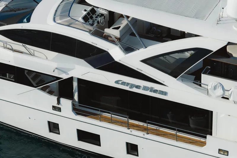 Carpe Diem Yacht Photos Pics Luxury Azimut yacht "Carpe Diem" 2023, sleek design, docked on water.